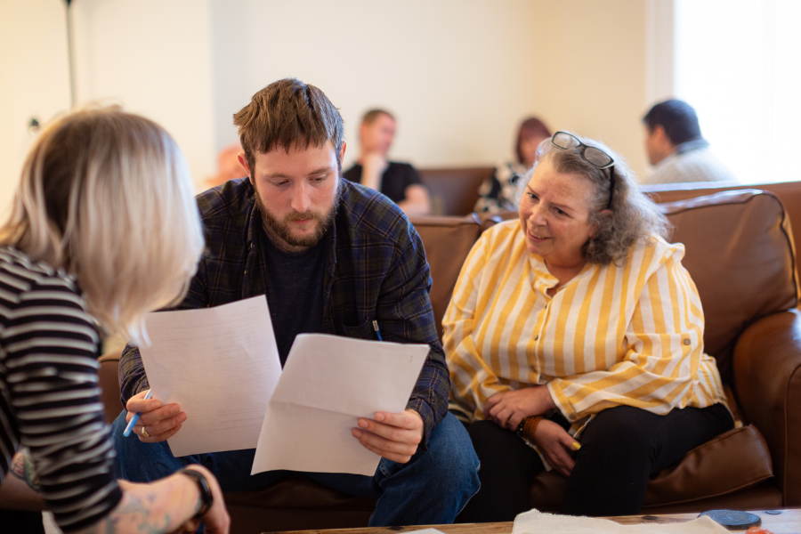 example of a resident at The Bridges Hull holding paperwork